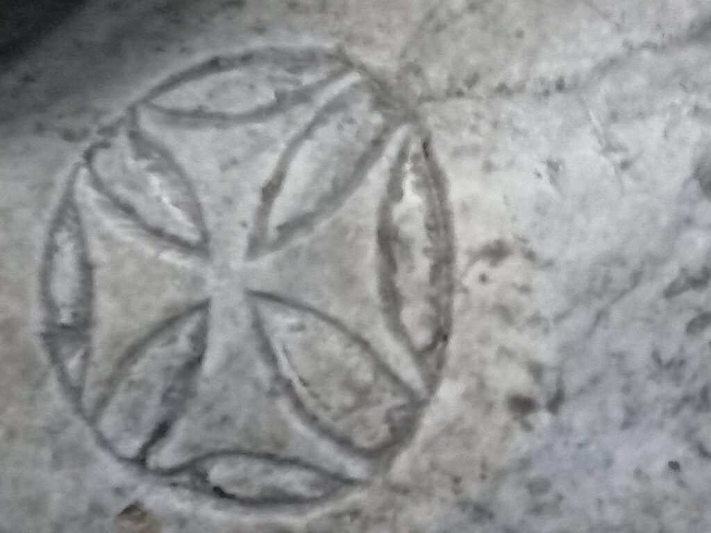 Another Knights Templar cross curved on one of the twin pillars