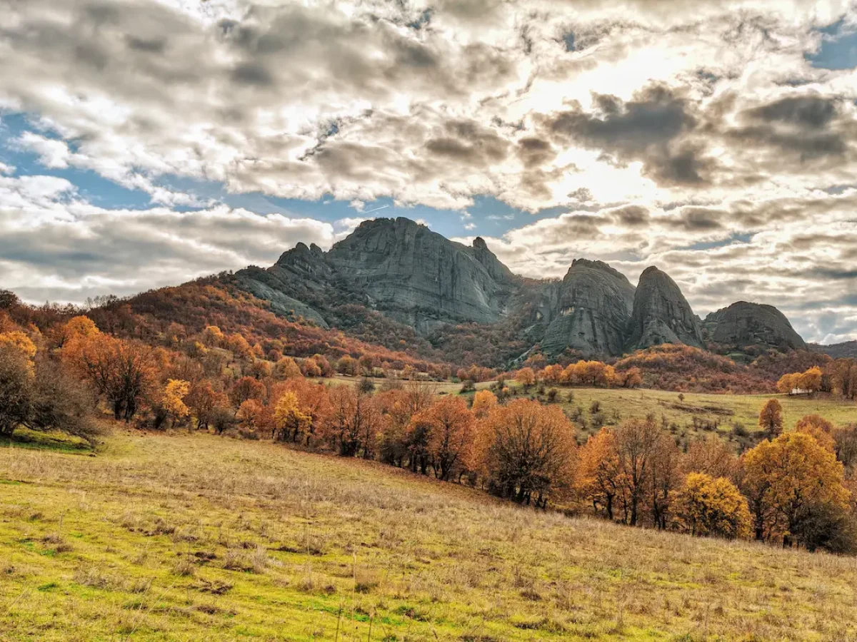 Autumn landscape with mountains and clouds at Gavros village Meteora